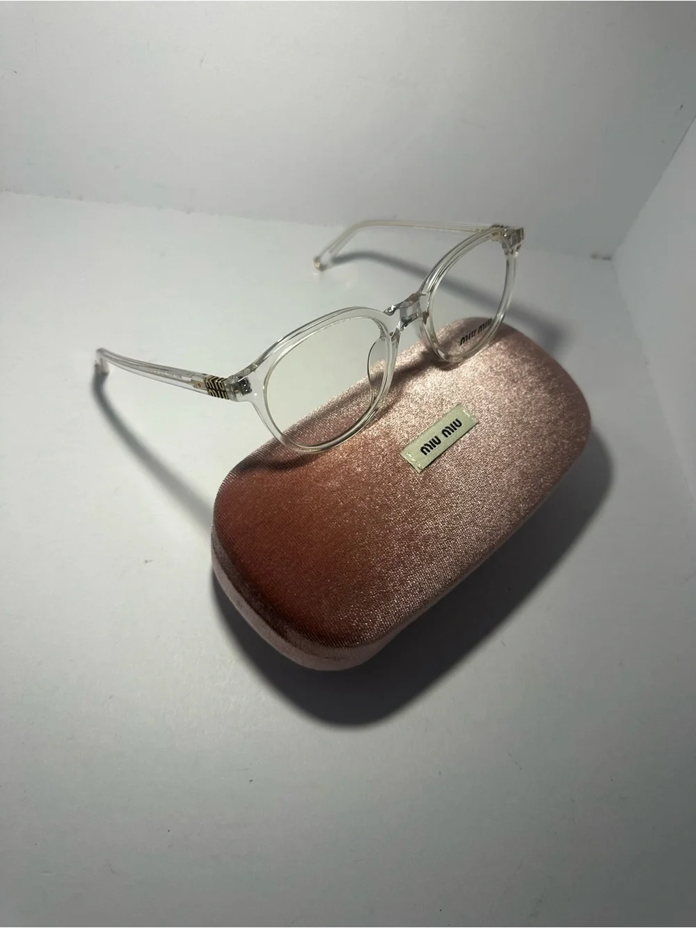 Miu Miu Clear Round Eyeglasses with Pink Velvet Case